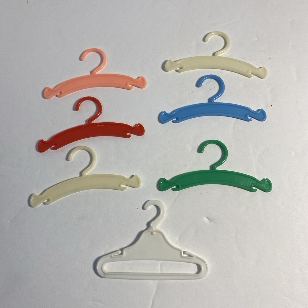 VTG Fashion Doll Hard Plastic Hangers Lot Of 7 1980s Blue White Green Red Peach